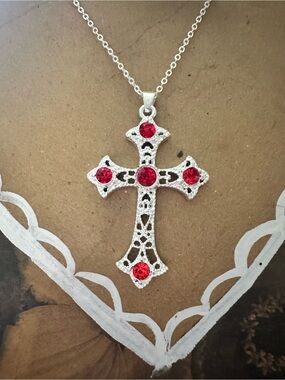 Silver Cross Necklace with Red Gemstone Accents